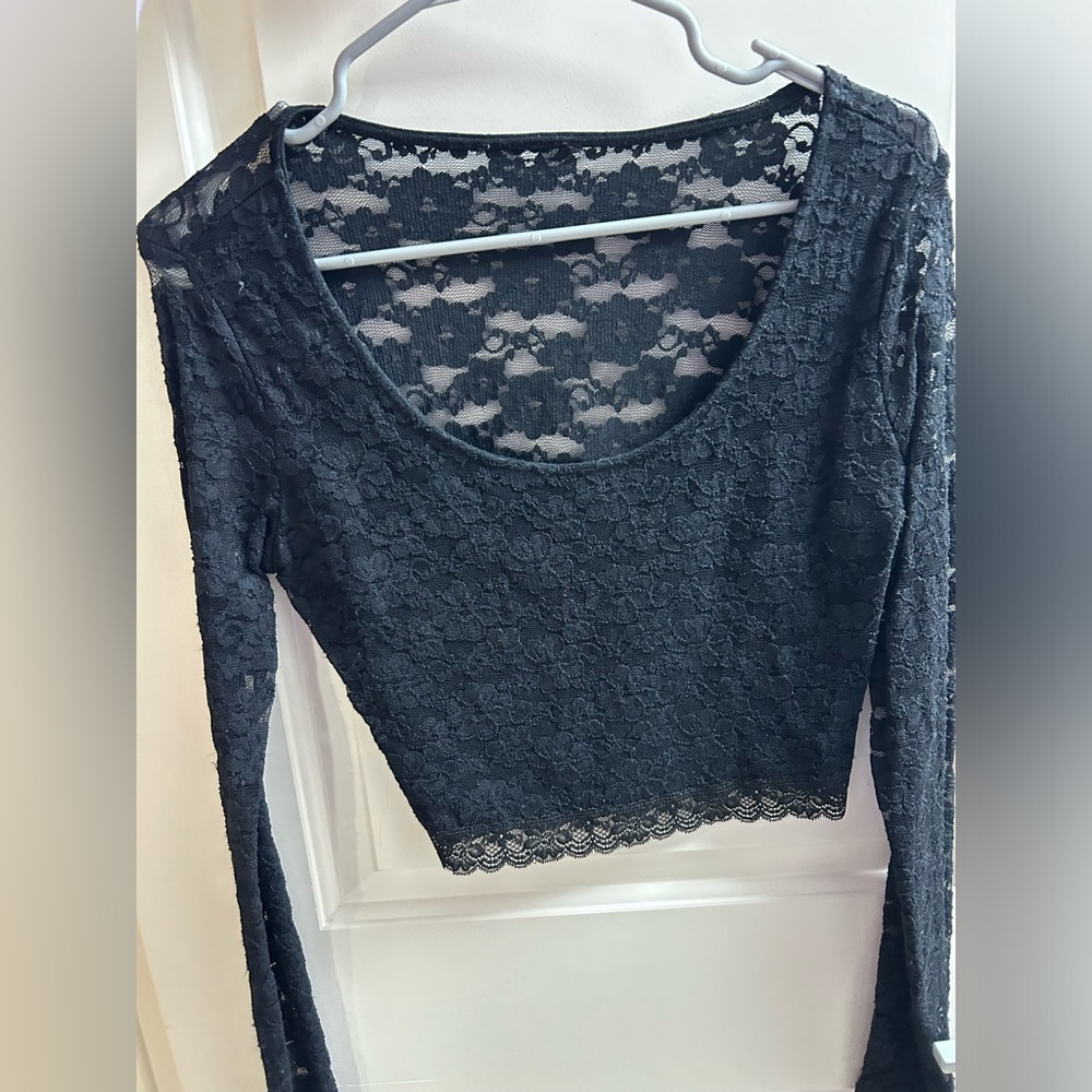 Lace black crop long sleeve. Snug fit